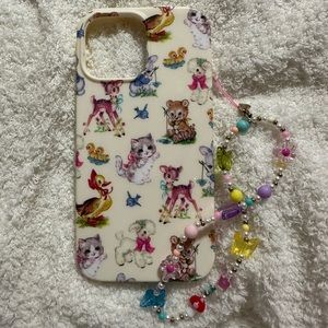 Velvet caviar iPhone 13 Pro Max case with charm